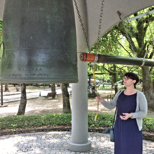  5 Susan ringing the Peace Bell.JPG 